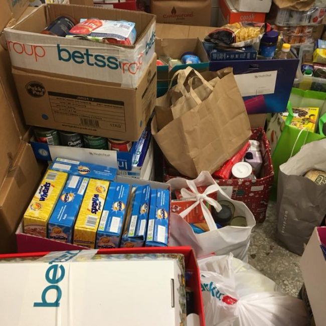 Collect food, clothes, games for families in need